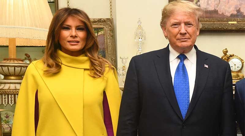 Melania Trump and Donald Trump standing together